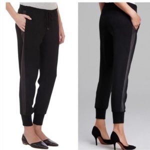 New without tags Vince joggers with genuine leather tuxedo stripes. Size Small.